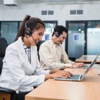 young-asian-operator-woman-agent-with-headsets-working-customer-service-call-center_49071-2648